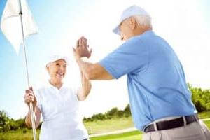 couple golfing